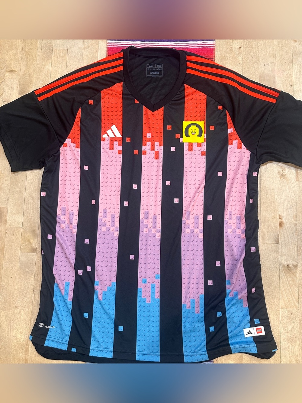 Lego Black Jersey with Red Pink and Blue Graphic Stripes